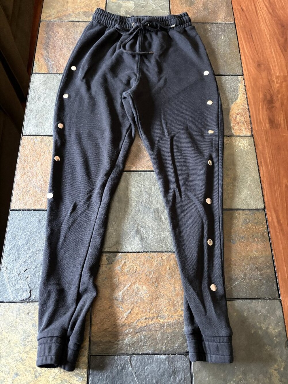 Romeo & Juliet Couture black joggers with silver toned stud accents size S